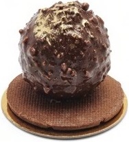 A hard shell round shape chocolate cake